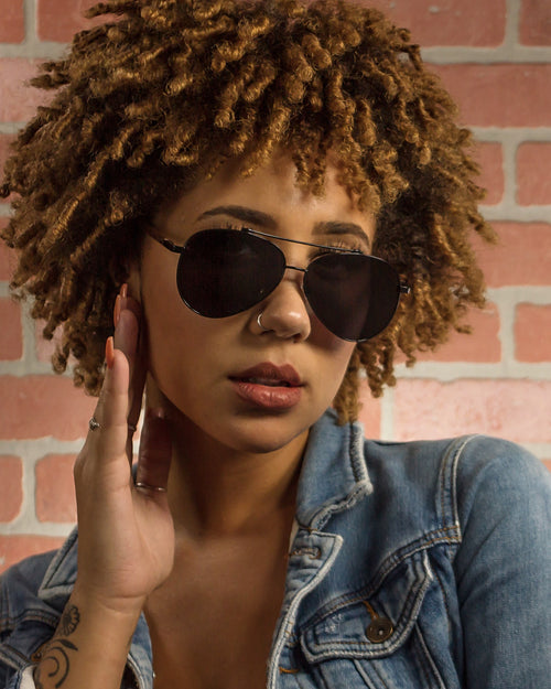 Black's Beach Polarized Aviator Wood Sunglasses worn by a customer model