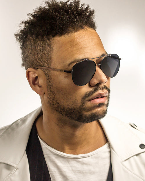 Black's Beach Polarized Aviator Wood Sunglasses worn by a customer model