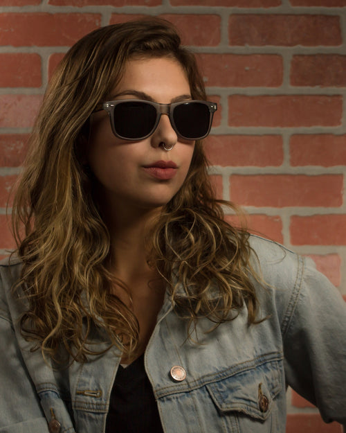 Rockport Polarized Round Bamboo Sunglasses worn by a customer model