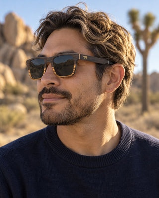 Joshua Tree polarized sunglasses worn by a man on a desert trail in Joshua Tree