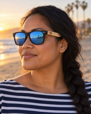 Santa Barbara polarized sunglasses worn by a woman at East Beach in Santa Barbara at golden hour